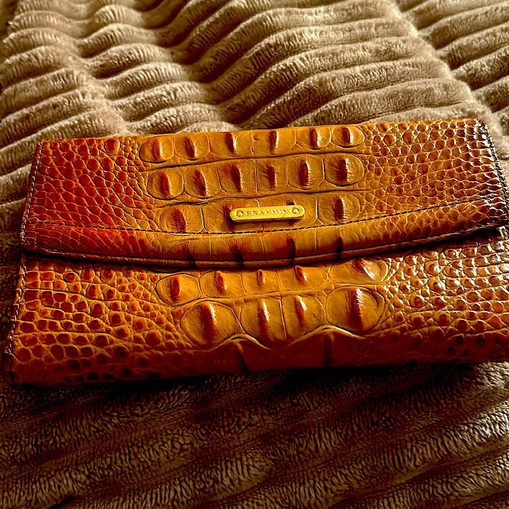 Brahmin wallet, snap closure with multiple credit card slots, barely used.
